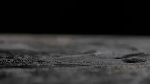 Nuts fall on the table close-up black background Stock Footage 69919753