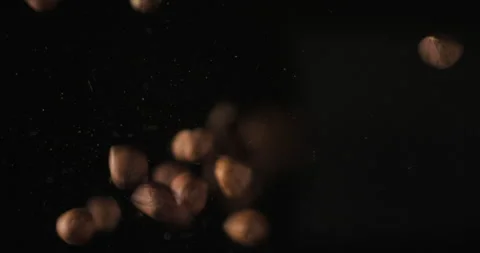Nuts falling from below, slowmotion low angle 4K pro res Stock-Footage 275897653