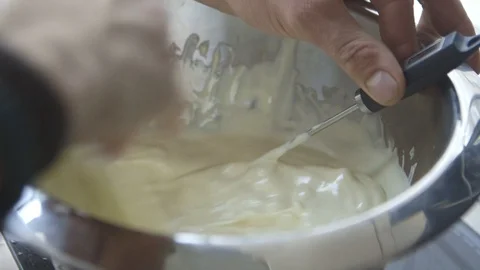 Nuts Getting Covered In White Chocolate Stock Footage 127179984