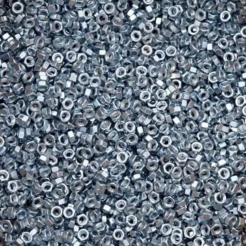 Nuts hardware Big bunch of hexagon nuts abstract pattern Copyright: xZoona... Stock Photos