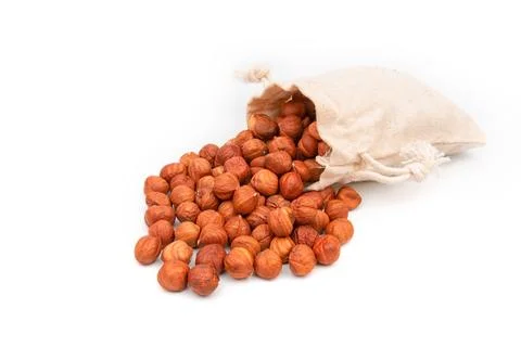 Nuts hazelnut in a bag on a white background Stock Photos