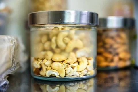 Nuts in jars close Foto stock