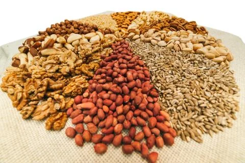 Nuts mix in a canvas bag in table. Stock Photos