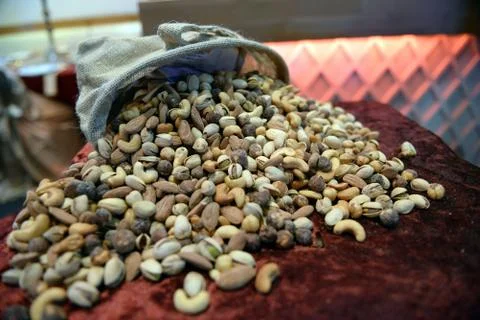 Nuts mix in a canvas bag in table. Ten kinds of nuts. Fotos de archivo