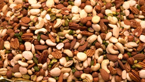 Nuts mix close up. Walnuts, pistachios. Almonds, hazelnuts, cashews 스톡 동영상 116266676