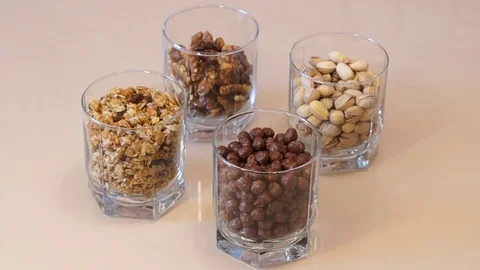 Nuts mix. Pistachios. Walnut. Assorted nuts. Muesli. Chocolate Corn Balls Stock Footage 88295174