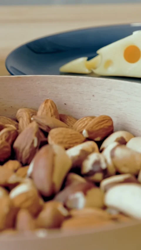 Nuts. nut platter in a plate. close-up. healthy food. Useful Healthy Vegetarian Stock-Footage 320535851