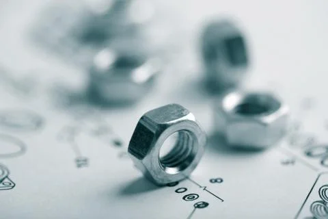 Nuts over technical drawing Stock Photos
