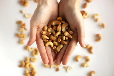 Nuts in the palms Stock Photos