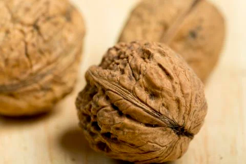 Nuts on a pine wood background. Stock Photos