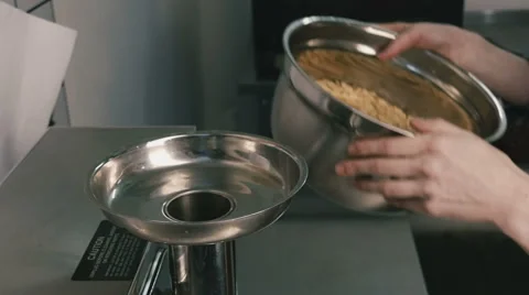 Nuts poured into the mixer. Close-up Stock Footage 58961931