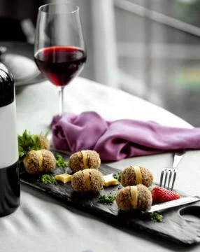 Nuts rolls with red wine Stock Photos