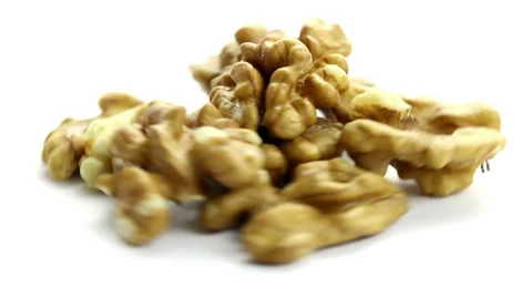 Nuts rotating fast, studio shot on white background Stock Footage 34535615