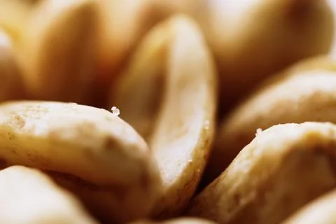 Nuts with salt crystals Stock Photos