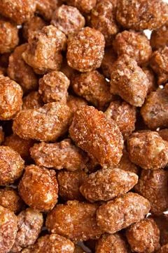 Nuts with sugar Stock Photos