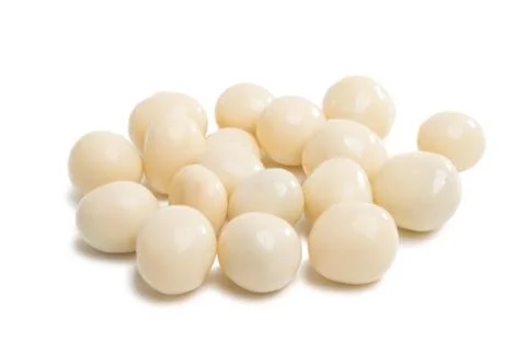 Nuts in white chocolate isolated Stock Photos