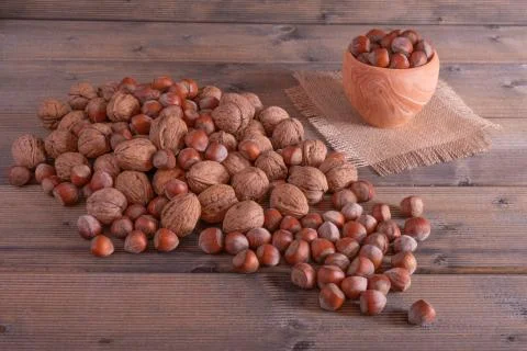 Nuts on a wooden table. Stock Photos