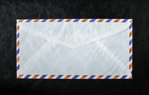 ?nvelope on black background Vintage envelope on black background. Red and... Stock Photos