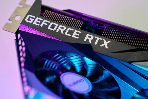 NVidia Geforce RTX 3060 Gaming graphics card illuminated by neon lighting Foto stock