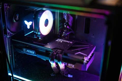 NVIDIA GeForce RTX graphics card in modern colorful computer system with RGB Stock Photos