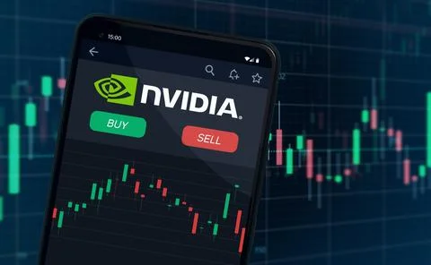 Nvidia logo on mobile phone screen company shares rise or fall on stock market Stock Photos