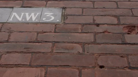 NW3 postcode tiles on North West London building Stock-Footage 107621531