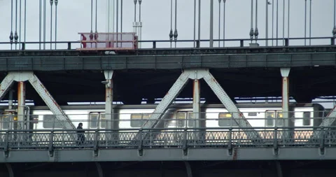 NY City Subway crosses over the Manhattan Bridge, Yellow Line RWQN Stock Footage