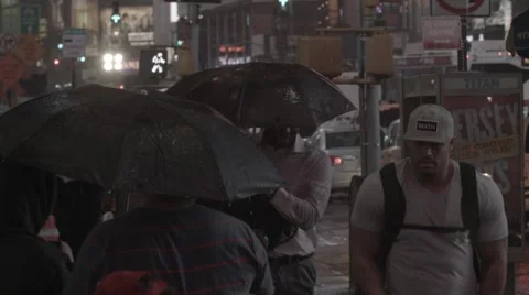 NY Time Square People waking on the rain umbrellas Stock Footage 40367678