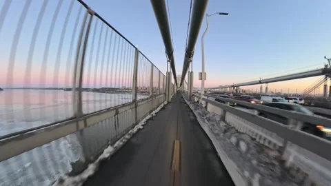 NYC Bridge Path POV Ride at Sunset With Snowy Conditions Vídeos de archivo 331534023
