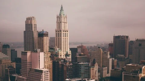NYC Building Time Lapse with Sun Bursts through Clouds Stock Footage 70728557
