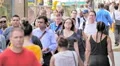 NYC crowd large group business people walk New York City commuters slow motion HD Footage