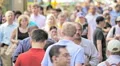 NYC crowd large group people walk Manhattan New York City commuters slow motion HD Footage