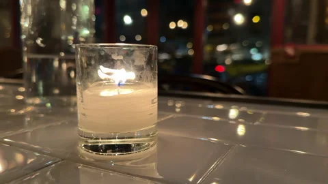 NYC evening tea light candle - slow motion Stock Footage 264658373