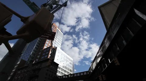 NYC HIGHLINE LOOK UP CLOUDS FAST MO Stock Footage 973977