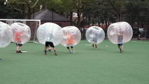 NYC, Human bubble ball, Zorbing. Midtown Manhattan. Westside bubble ball soccer Stock Footage 220620756