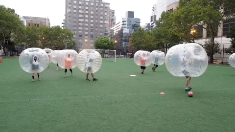 NYC, Human bubble ball, Zorbing. Midtown Manhattan. Westside bubble ball soccer Stock Footage 220620890