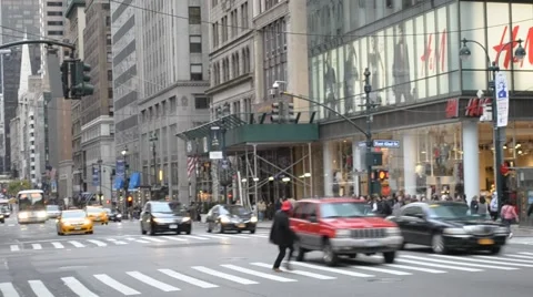 In NYC A Man Jaywalking And Many People Crossing The Street Intersection Stock Footage 63085171