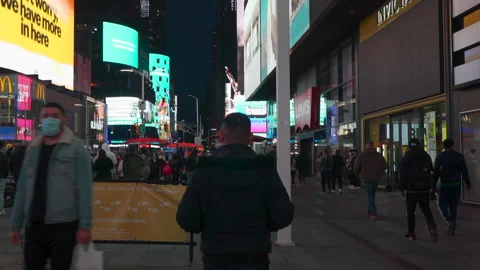 NYC Man walking through Time Square Cinematic shot Stock Footage