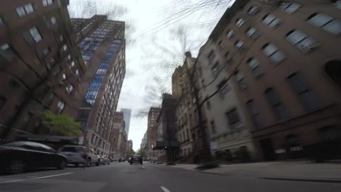 NYC MIDTOWN NONDESCRIPT SIDESTREET DRIVING POV Stock Footage 155176060