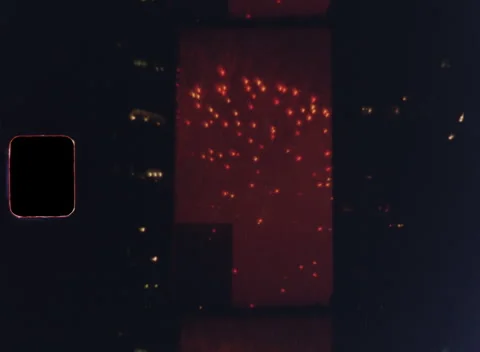 NYC Night Fireworks Between Buildings Super 8 3K Vídeo Stock 331996106