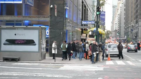 NYC People Waiting At Intersection Crosswalk, and Taxi's Turning The Corner Stock Footage 63086483