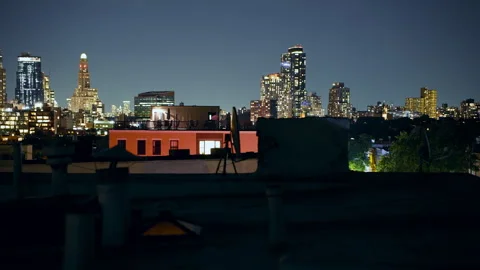 NYC Rooftop Night Time-Lapse: Stars, Skyline, and Gliding Planes Stock Footage 260036835