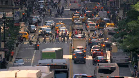 NYC rush hour cars commute busy street traffic jam Manhattan New York City day Stock Footage