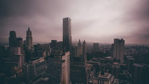 NYC Skyline Time Lapse with Sun Bursts through Clouds Stock Footage 70728673
