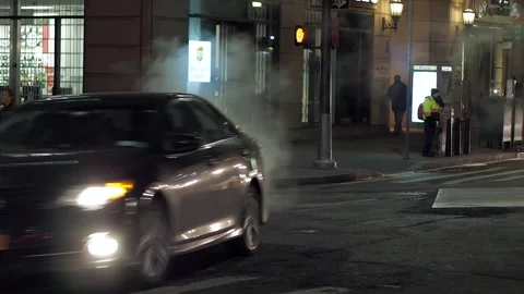 NYC streets, utility workers, steam, cars traffic, bitter cold. 3 Stock Footage 220727459