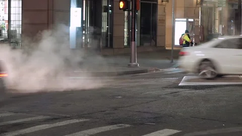 NYC streets, utility workers, steam, cars traffic, bitter cold.5 Stock Footage 220727727