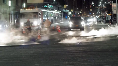 NYC streets, utility workers, steam, cars traffic, bitter cold.13 Stock Footage 220727857