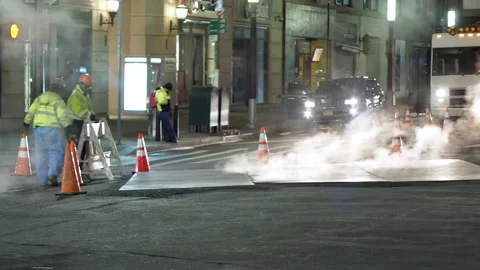 NYC streets, utility workers, steam, cars traffic, bitter cold.12 Stock Footage 220728432