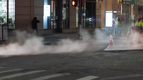 NYC streets, utility workers, steam, cars traffic, bitter cold.9 Stock Footage 220728439