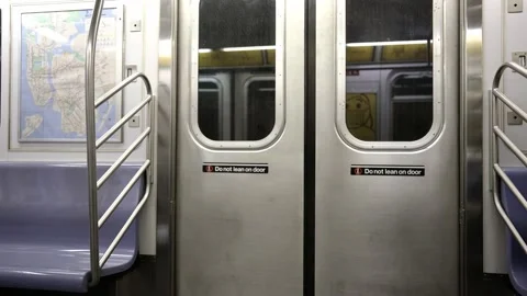NYC Subway car inside. Moving train in NYC. Do not lean on Doors Stock Footage 199174699